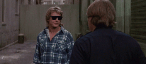 They Live Movie Roddy Piper Talking GIF