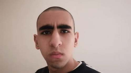 Thick Eyebrow Thommaaas Shaking Head GIF