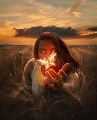 This Girl Is On Fire Holding Butterfly GIF