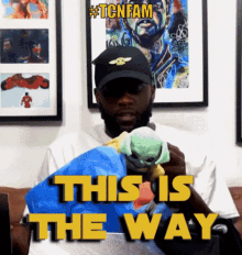 This Is The Way Guy Playing With Yoda Toy GIF