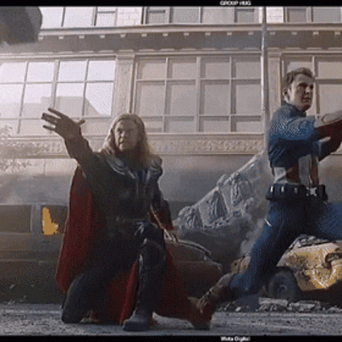 Thor and Captain America Fighting in Front of Group Hug Building
