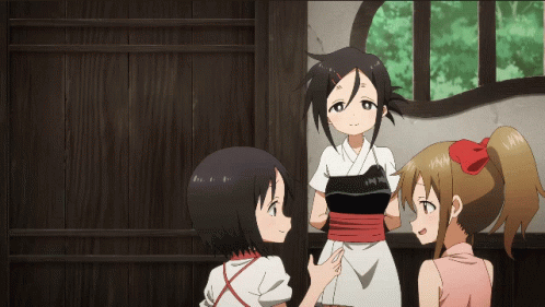 Three Anime Girls Standing Next to Each Other