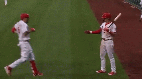 Three Baseball Players On Field GIF
