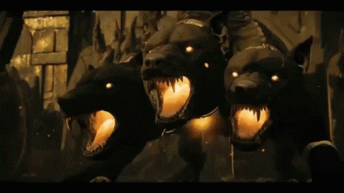 Three Black Dogs With Glowing Eyes Mouths Open