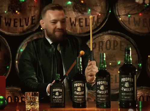 Three Bottles of Proper Twelve Irish Whiskey