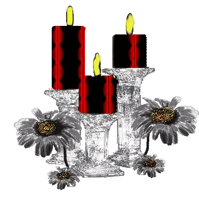 Three Candles in Clear Candle Holder With Flowers