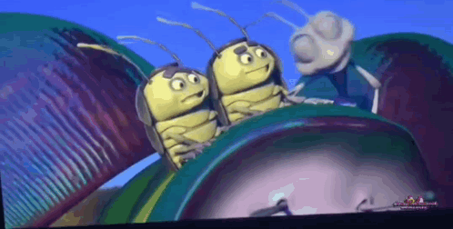 Three Cartoon Bugs Are Sitting On Top Of A Green Object GIF