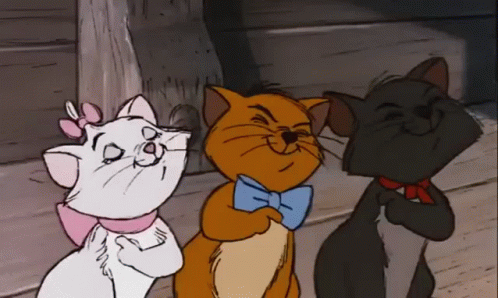 Three Cartoon Cats Are Standing Next To Each Other And One Of Them Is Wearing A Bow Tie GIF