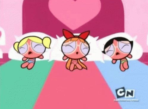 Three Cartoon Characters Lying on Bed