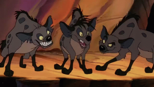 Three Cartoon Hyenas Are Standing Next To Each Other On A Rock GIF