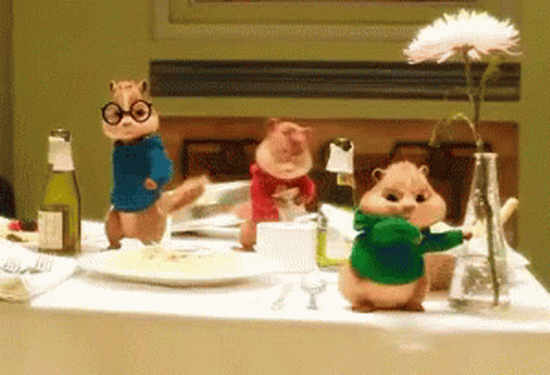 Three Chipmunks With Vase Of Flowers And Wine Bottle GIF