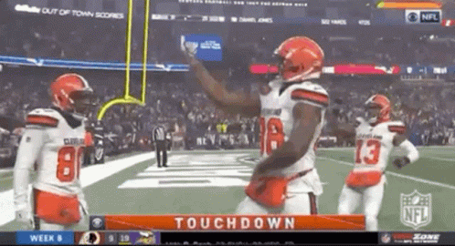 Three Cleveland Browns Players Celebrating Touchdown