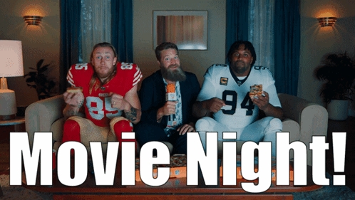 Three Football Players on Couch Movie Night