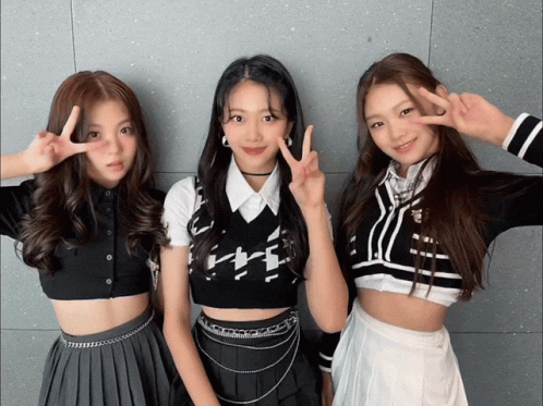 Three Girls Are Posing For A Picture And One Of Them Is Wearing A Crop Top That Says ' A ' On It GIF