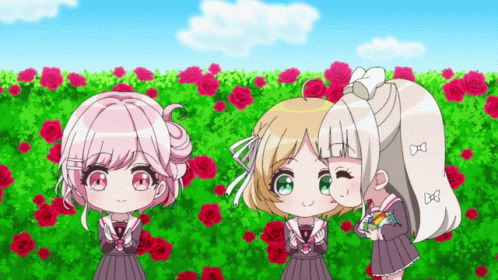 Three Girls Are Standing In Front Of A Field Of Roses GIF