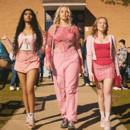 Three Girls in Pink Walking to School