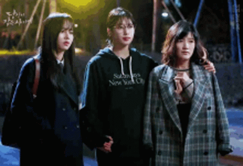 Three Girls One Wearing New York City Sweatshirt