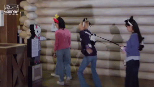 Three Girls Walking In Front Of Summer Diary Sign GIF