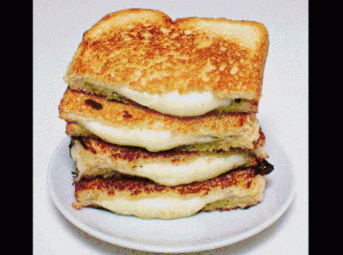 Three Grilled Cheese Sandwiches Stacked