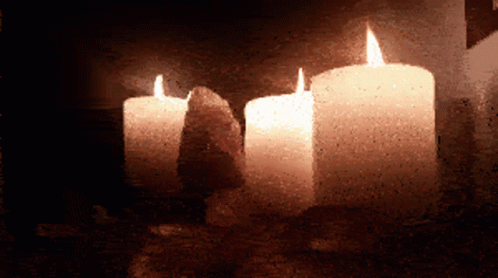 Three Lighted Bougie GIF