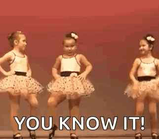 Three Little Girls In Tutus Are Dancing On A Stage And The Words `` You Know It '' Are Above Them . GIF