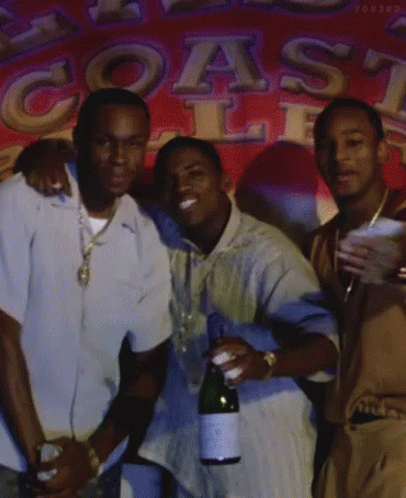 Three Men Are Posing For A Picture In Front Of A Sign That Says Coast Club GIF