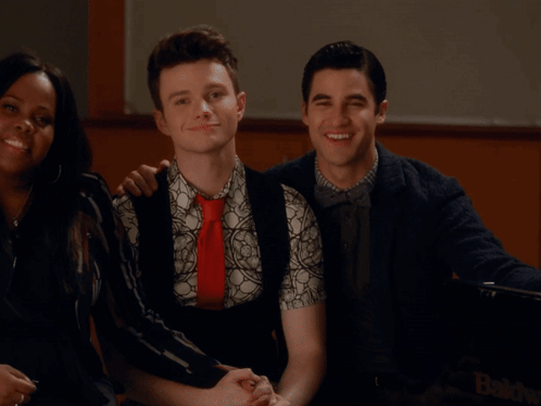 Three Men Are Posing For A Picture With The Name Adley Buecker In The Corner GIF