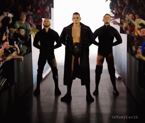 Three Men Are Standing In A Hallway With Tiffanyluv24 Written On The Bottom GIF