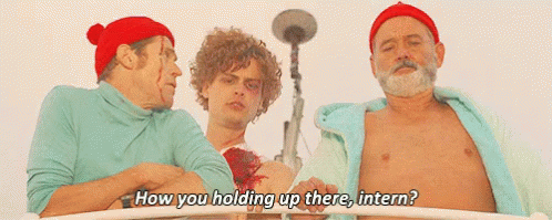 Three Men Are Standing Next To Each Other And One Of Them Says How You Holding Up There Intern GIF