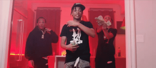 Three Men Are Standing Next To Each Other In A Room Holding Stacks Of Money . GIF