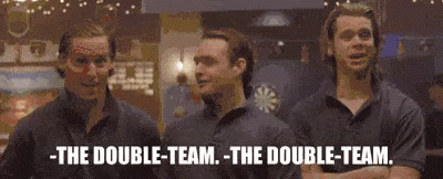 three men are standing next to each other with their arms crossed and the words `` the double-team , the double-team . '
