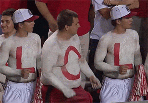 Three Men Covered In White Paint With Letter L GIF