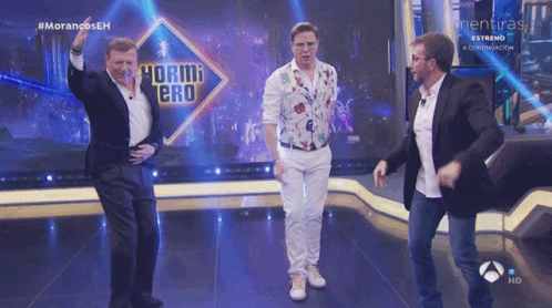 Three Men Dancing on Stage