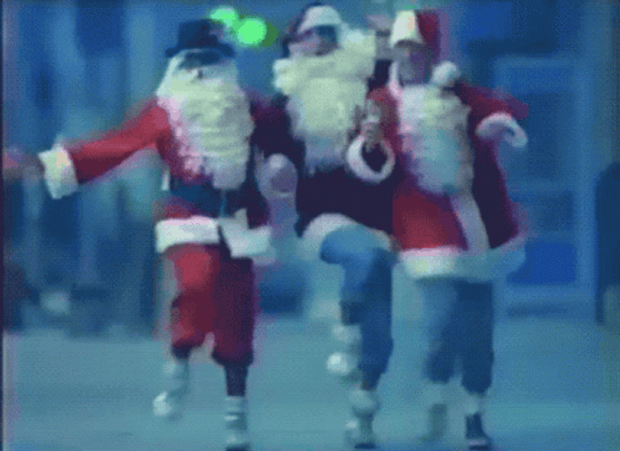 Three Men Dancing Wearing Santa Outfit GIF