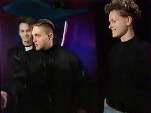 Three Men Holding Gold Record