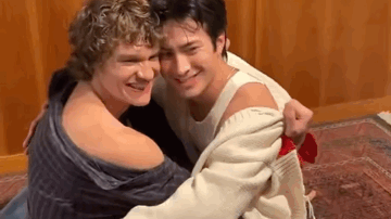 Three Men Hugging