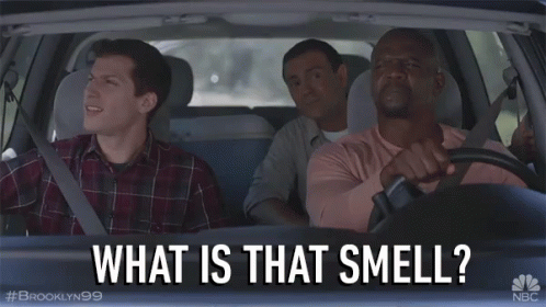 Three Men In A Car With The Words " What Is That Smell " On The Screen GIF