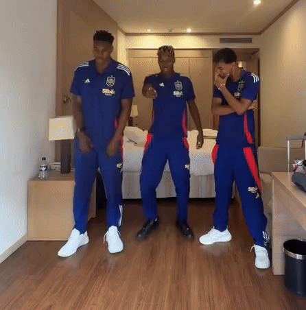 Three Men in Blue Adidas Shirts