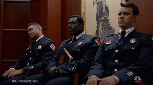 Three Men in Chicago Fire Uniforms