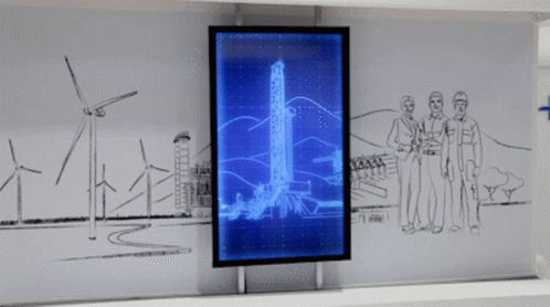 Three Men in Front of Blue Screen With Wind Turbines