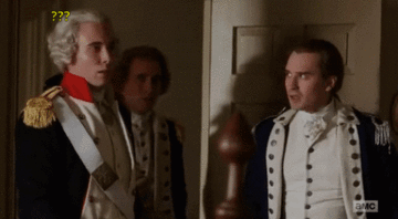 Three Men in Military Uniforms at Door with Question Mark