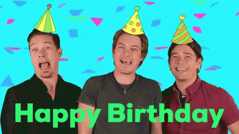 Three Men in Party Hats Singing Happy Birthday