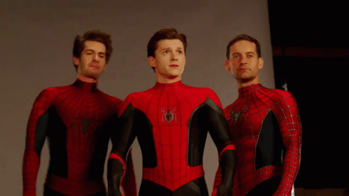 Three Men In Spider-Man Costumes Stand Next To Each Other GIF