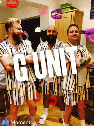 three men in striped shirts are standing in a kitchen and the word gunit is on the front