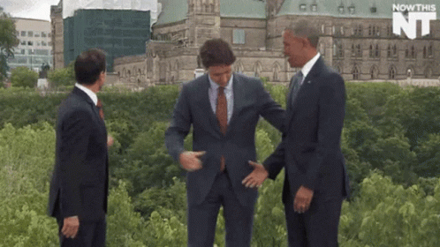 Three Men In Suits At Nowthis NT Building GIF