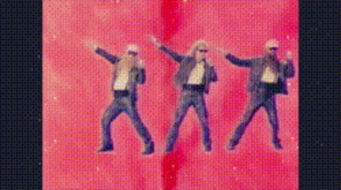 Three Men In Suits Dancing On Pink Background GIF