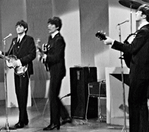 Three Men Playing Guitars Black and White