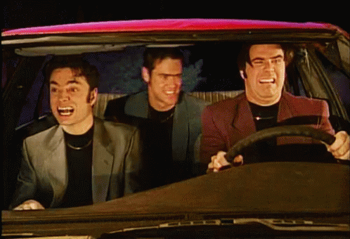Three Men Sitting in Car