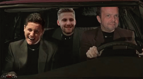 Three Men Sitting in Car