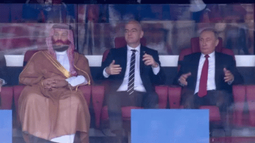 Three Men Sitting in Stadium One With Turban
